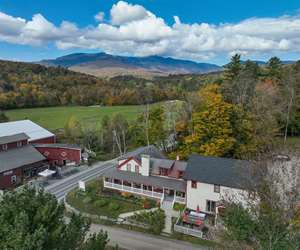 ariel view of Trattoria La Festa with Green Mountains